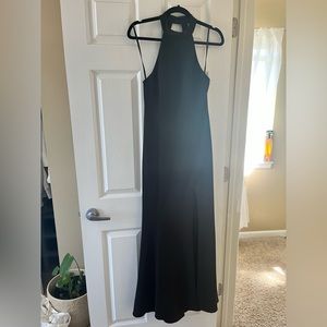 Black BHLDN formal dress with high neck and open back